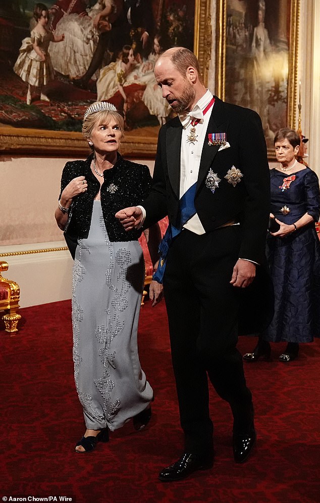 Viscountess Hood accompanied the Prince of Wales as they toured the East Gallery to attend the State Banquet for the Emir of Qatar, Sheikh Tamim bin Hamad Al Thani, at Buckingham Palace.