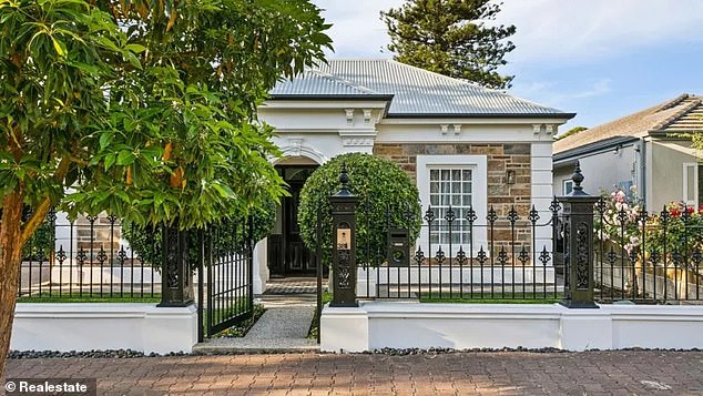 Carey's Adelaide property goes up for auction on the same day he plays for his country