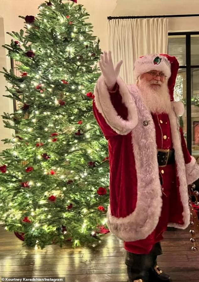 In another photo, Santa Claus is seen next to a Christmas tree.