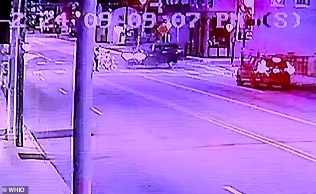 Terrifying security footage captured the moment the Hummer failed to stop as the family crossed a crosswalk while on their way to get milk from Family Dollar