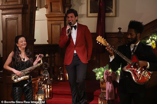 James looked incredibly dapper in a burgundy suit jacket and bow tie, paired with a crisp white shirt.