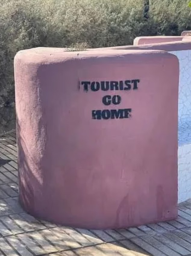 Graffiti have appeared in the Canary Islands inviting tourists to 'come home'