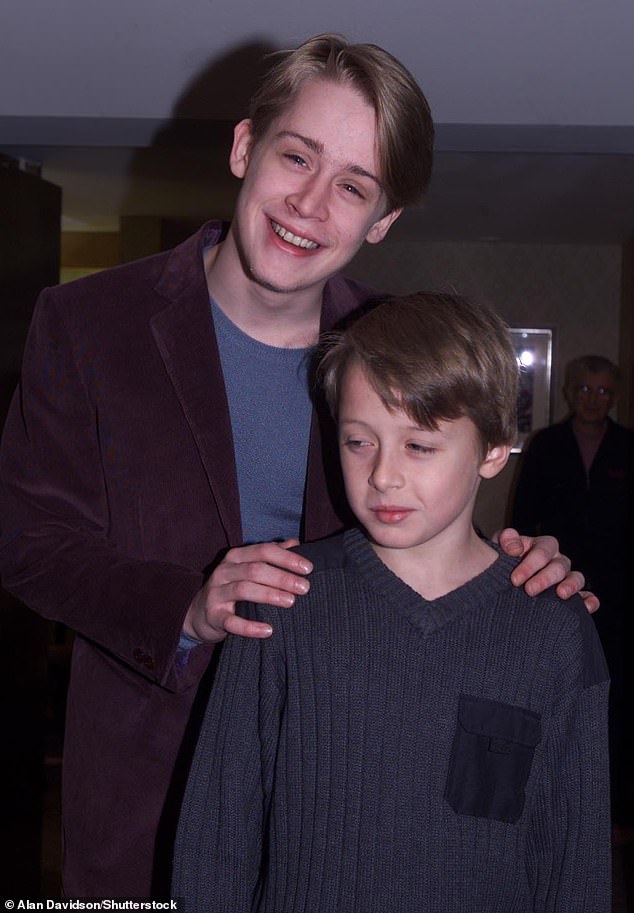 Home Alone was shot from February to May 1990, with the premiere taking place shortly before its release on November 16; the Culkin brothers pictured in 2000