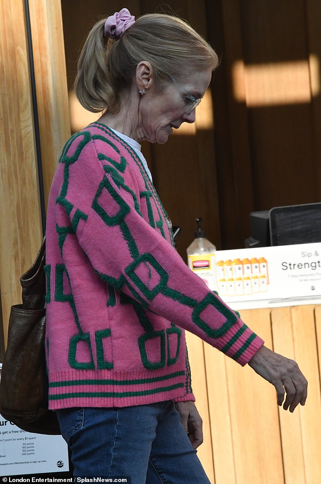 Hagerty, 62, was dressed casually in a chic cardigan and trousers with pink and green patterns and pulled back her blonde locks with a pink scrunchie