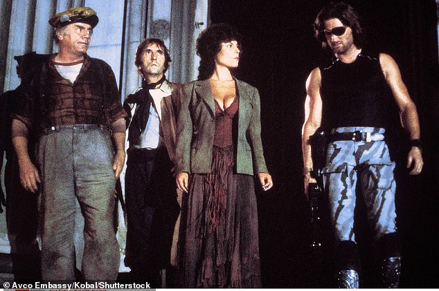 Barbeau starred in her then-husband John Carpenter's 1981 Escape from New York, which became a cult classic, alongside Kurt Russell (right), Harry Dean Stanton (center left) and Ernest Borgnine (left)