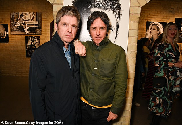 The Smiths guitarist Johnny Marr was among those invited to the National Portrait Gallery to view the portrait of Noel Gallagher.