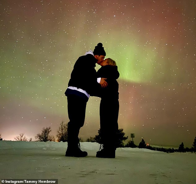 The newlyweds didn't shy away from showing their affection for each other in their latest post as they packed on the PDA while standing in front of the Northern Lights.