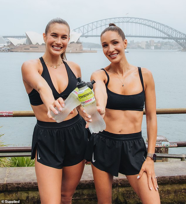 The influencer (right), 33, was joined by fellow fitness guru Katie Martin for an intense workout session to celebrate Kayla's Sweat app collaboration with Powerade Active Water.