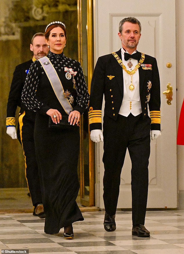 Queen Mary's glamorous diamond tiara was paired with a spectacular embroidered dress, which featured intricate beading on the arms and high neck.