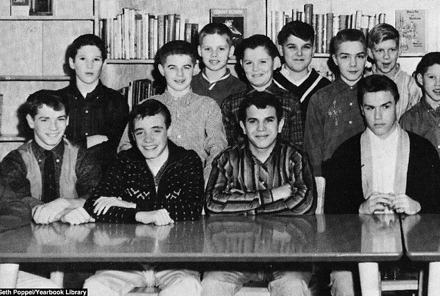 Gere is seen on the far left in the back row along with his fellow classmates in a 7th grade high school yearbook portrait