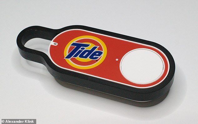 According to one expert, pushing buttons fuels consumerism. Pictured is Amazon Dash, which allows users to reorder their favorite items with the push of a button.