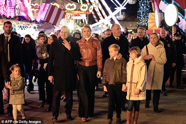 1733605405 768 Princess Charlene of Monaco attends the opening of the glittering