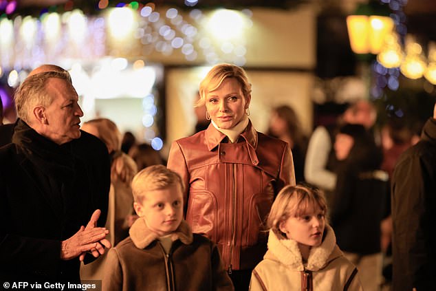 1733605407 157 Princess Charlene of Monaco attends the opening of the glittering