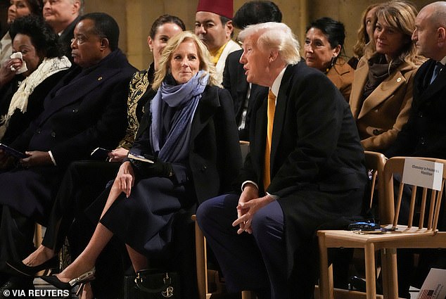 The president-elect found himself seated between French President Emmanuel Macron and his wife, Brigitte Macron, while Jill and Ashley Biden were also seated in the same row.