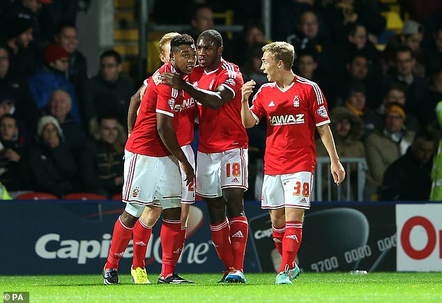 Antonio joined West Ham from Nottingham Forest (pictured in the center, in 2014) nine years ago.