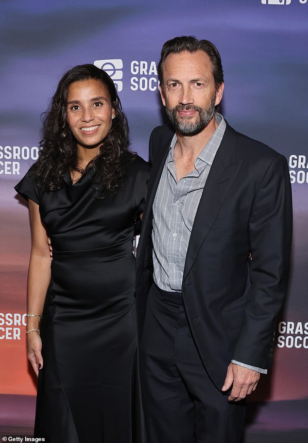 The couple walked the red carpet together at the 2024 Grassroots World AIDS Day Gala at Hall Des Lumières in New York City. When Shue and Fiebig took their relationship to the next level and made their red carpet debut earlier this week, they coordinated their prom outfits.