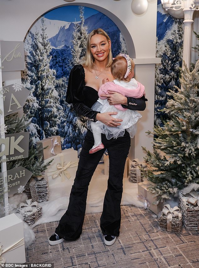 The model, 33, welcomed her first baby with comedian Jack Whitehall in September 2023 and was in great spirits as she attended the magical event in London with the baby in tow.