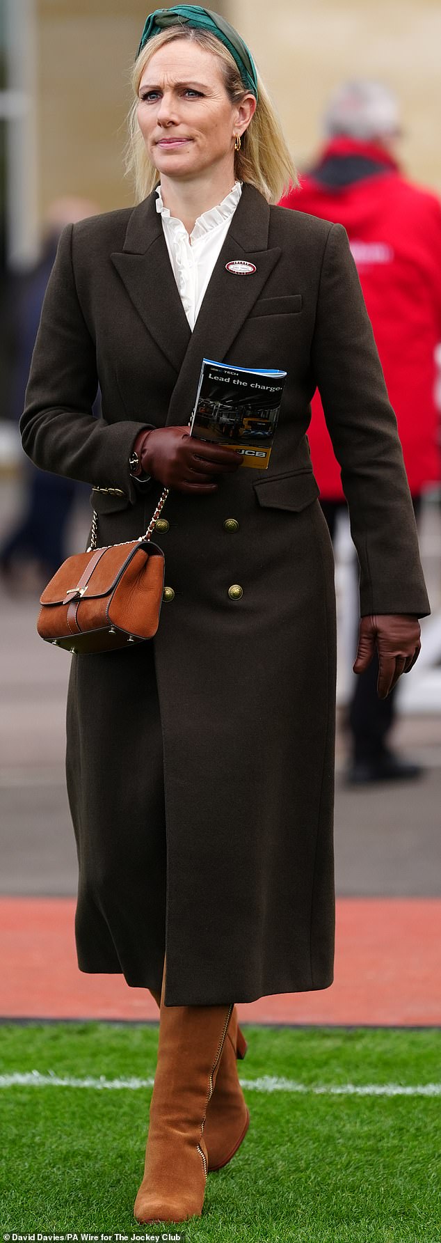 Zara opted for a more traditional look while attending Paddy Power Day at Cheltenham Racecourse in November this year (pictured)