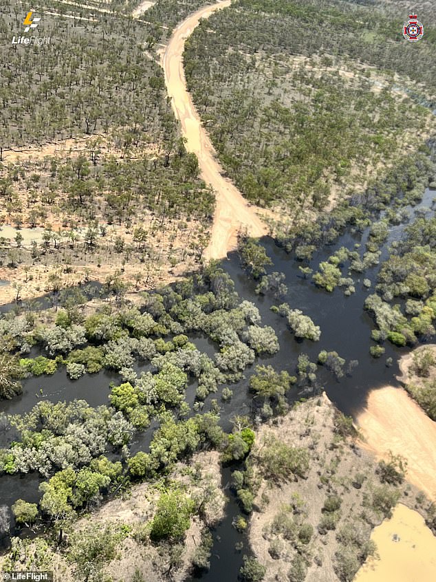 Floodwaters had swept away the couple's 4x4 loaded with all their belongings as they drove between two remote villages inland from the Gulf of Carpentaria.