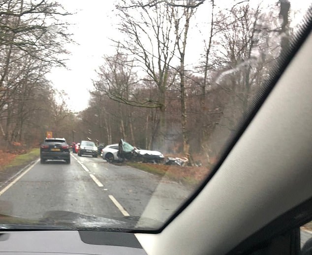 Another image appears to show the Premier League star's wrecked vehicle.