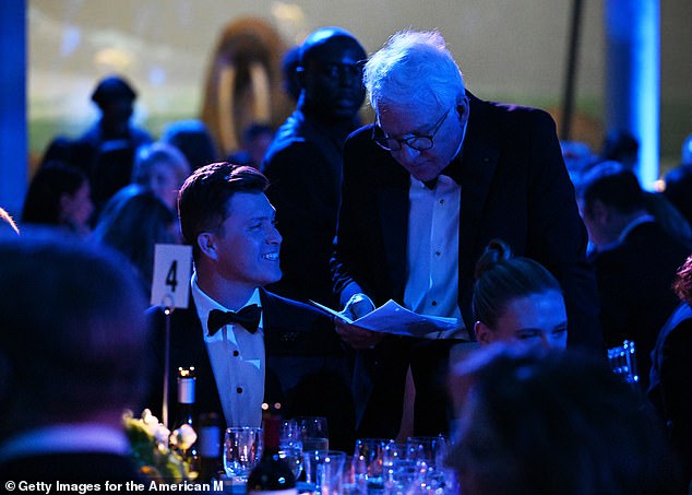 Colin Jost and Steve Martin chat at the coveted gala - where celebrities and millionaires gathered to support the American Museum of Natural History