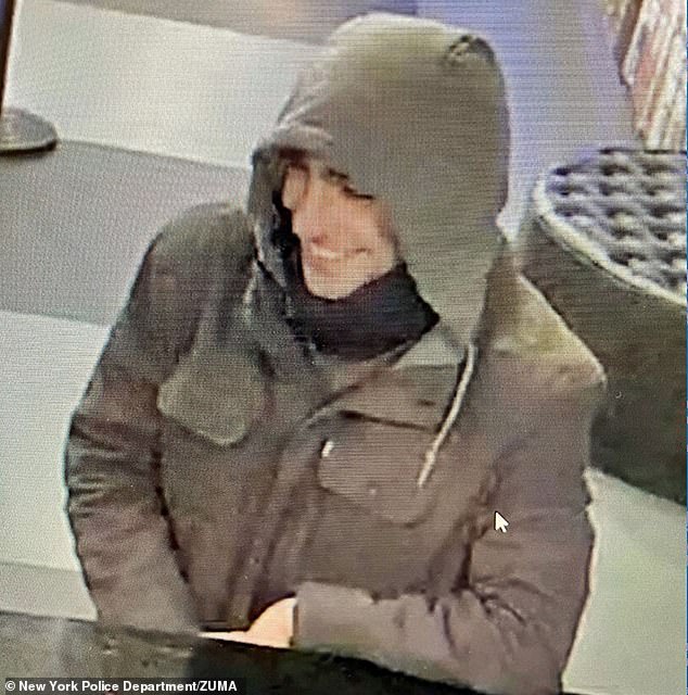 The New York police released several photographs of the alleged murderer. The suspect, pictured above, has been described as white and about 6'1' tall, but few details have been given.