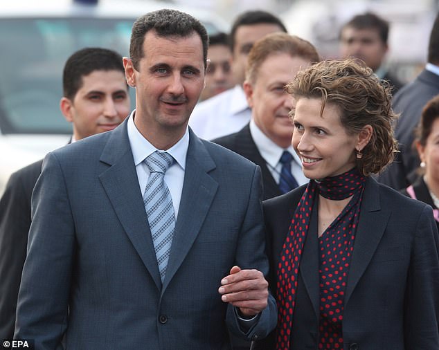 Bashar al-Assad (L) with his wife Asma al-Assad arrive at the international airport in New Delhi, India, June 17, 2008