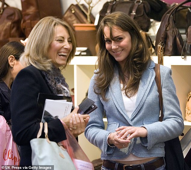 Carole and Kate share a joke while visiting the Spirit Of Christmas shopping festival at London's Olympia exhibition center in 2005.