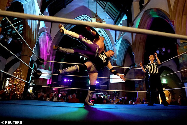 Wrestlers Gareth Angel and Jimmy Jackson compete during Kingdom Wrestling