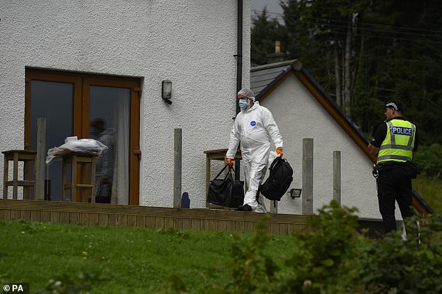 Forensic officers at the MacDonald home in Teangue on the Isle of Skye