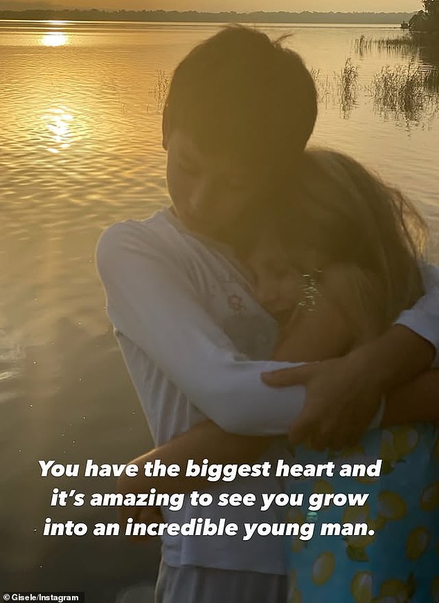 A second photo of the birthday boy hugging his younger sister Vivian, now 12, at sunset on the beach. She praised him for having 