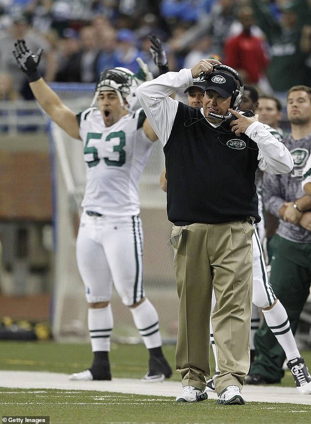 Rex Ryan and Josh Mauga of the New York Jets celebrate a 23-20 victory over the Detroit Lions at Ford Field on November 7, 2010. New York would make the playoffs that season.