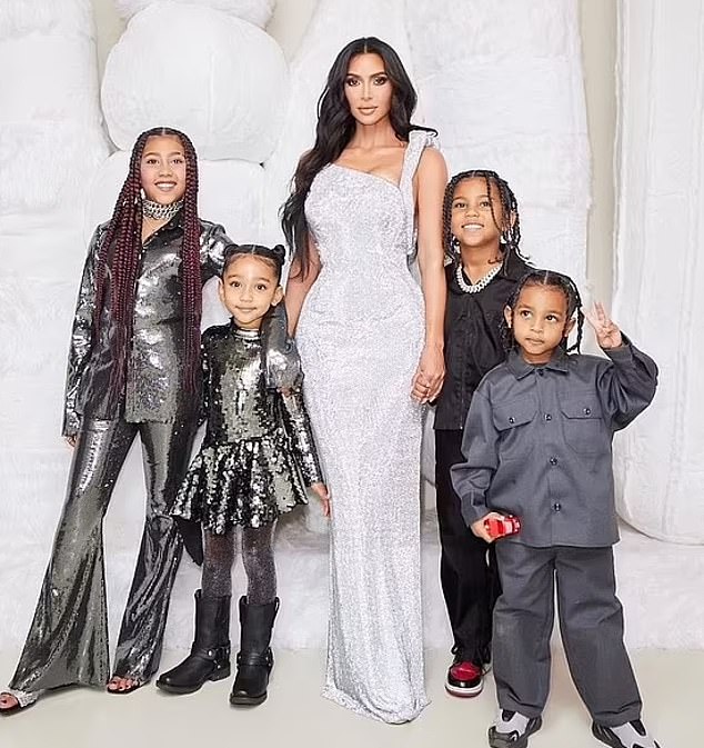 The mother of North, 11, Saint, nine, Chicago, six, and Psalm, five, has been getting into the Christmas spirit with her children; seen in a throwback snapshot