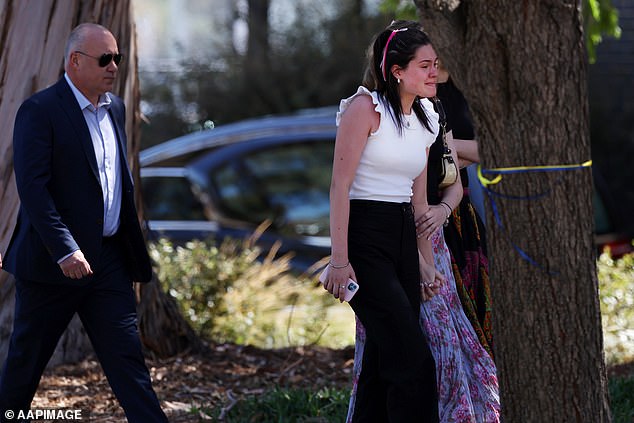 Tears flowed outside Beaumaris Secondary College on Monday.