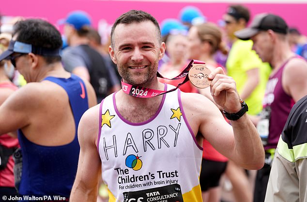 Drummer Harry Judd said exercise is his therapy, as he has struggled with anxiety for most of his adult life. Pictured after running the 2024 London Marathon.