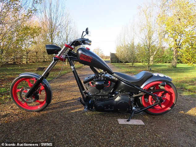 The famous baker has put the motorcycle, a Big Dog Ridgeback (pictured), up for auction.