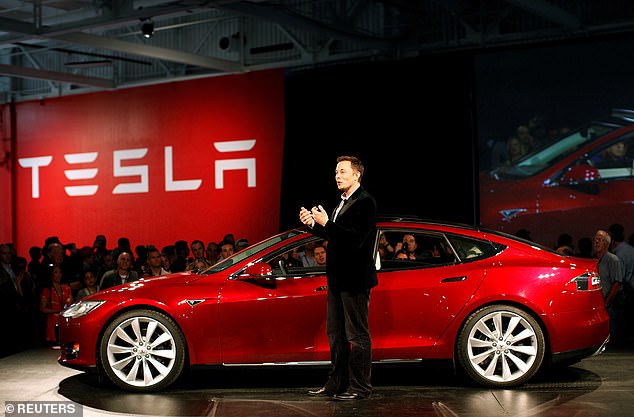 Musk unveils the Testa Model S in October 2011. In their complaint, Mendoza's parents, Eduardo and Maria, said their son bought his used Tesla Model S in 2021 after reading messages from Musk and the car company claiming that his vehicles could drive themselves.