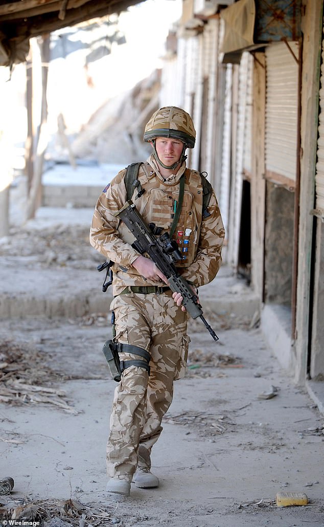 Prince Harry during his first tour of Afghanistan as the royal family patrolled the abandoned town of Garmisir on January 2, 2008 in Helmand province