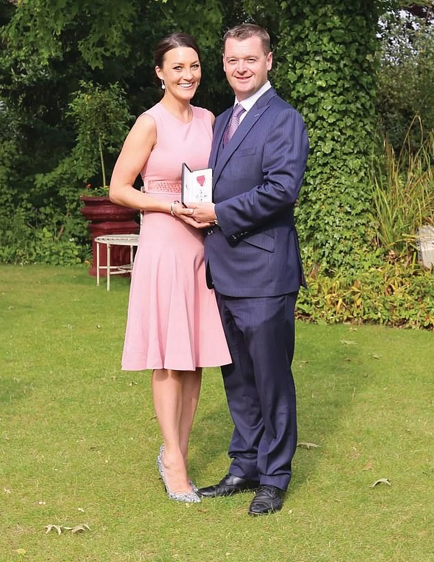 Jones' success led to him being appointed MBE in 2015 for services to the digital economy (pictured with wife Gail)