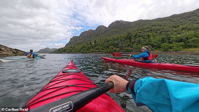 The kayaking session was led by Lee Woodward from Sea Kayaking Plockton. Above: Carlton and Jude in the water with Lee