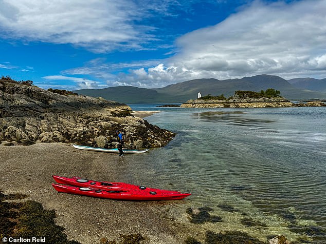 Lee on the Coral Island of Loch Carron, which is covered in bleached seaweed