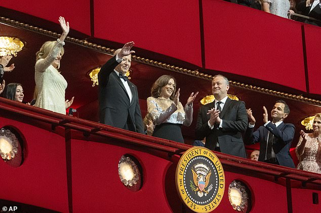 The first couple waved to the audience at the art awards ceremony as they received a standing ovation and refused to acknowledge Harris and Emhoff, who were sitting right next to them.