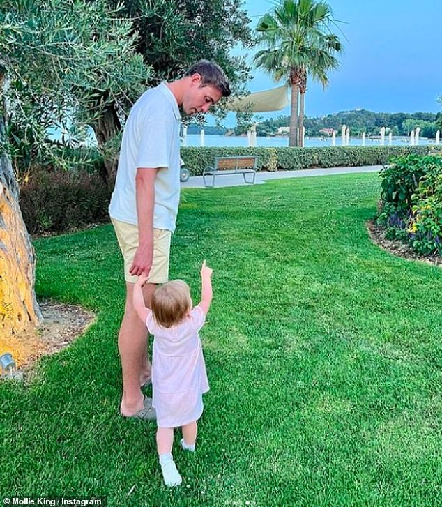 She wrote in the caption: 'Our baby girl is going to be a big sister! Can't wait to meet you little one?!' (Stuart and Annabella are seen)