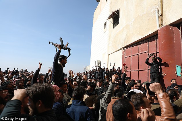 A crowd descended on Sednaya Prison, where thousands of people are said to have been held and tortured by the Assad regime over the past decade.