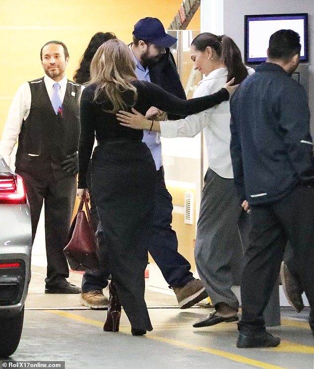 The actress, 55, who missed out on a Golden Globe nomination, smiled as she was greeted by friends at the Los Angeles office.