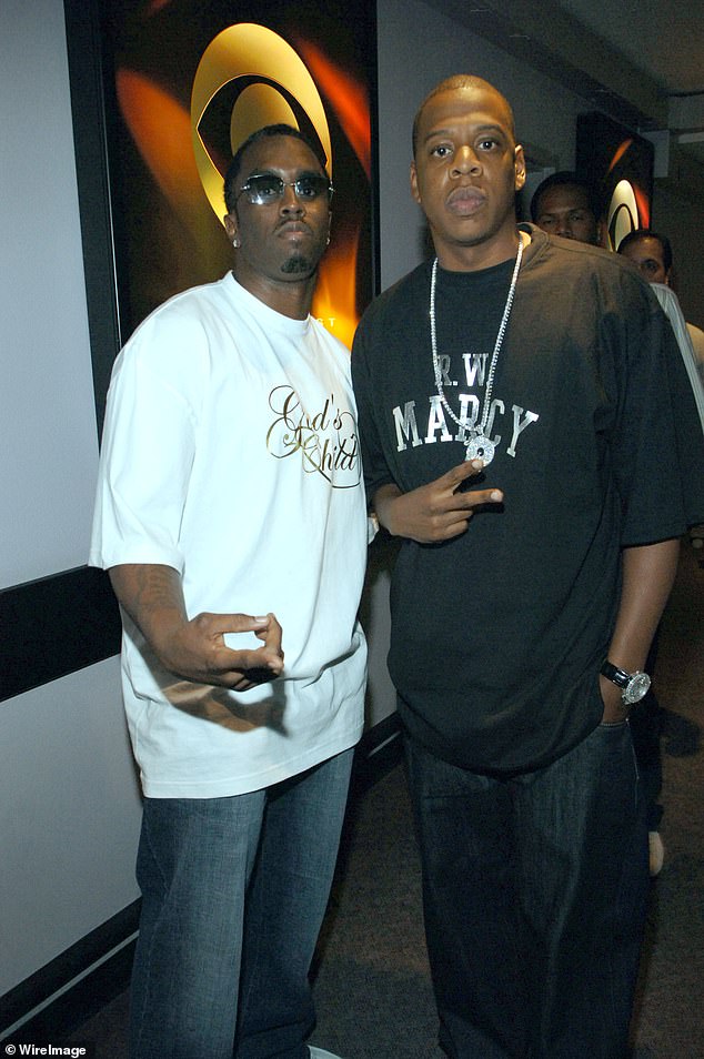 The anonymous victim previously referred to the rapper, whose real name is Shawn Corey Carter, as 'Celebrity A' in the explosive submission. Jay-Z has denied the allegations. (Pictured: Diddy and Jay-Z during "DISTRESS CALL" The BET Telethon Relief Show at CBS Studios in 2005)