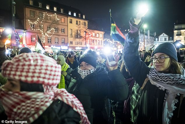 People who attended the event turned on their phone lights to show solidarity