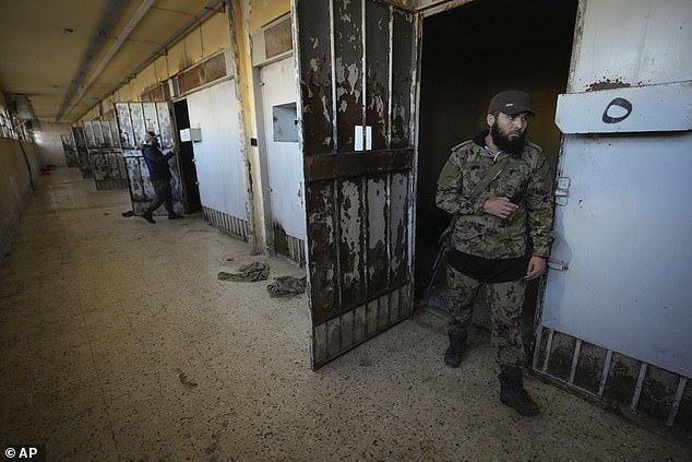 Rebels inspect cells at infamous Saydnaya military prison