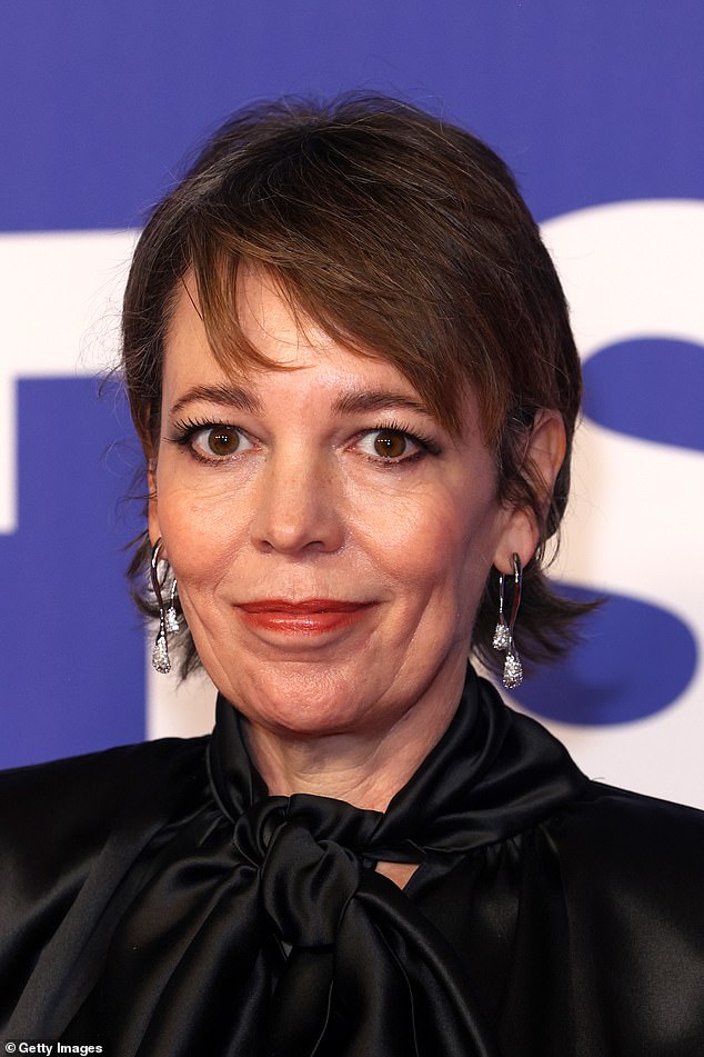 Actress Olivia Colman positively glowed on the red carpet on Saturday night.