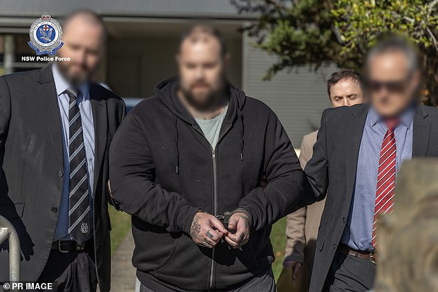 Callaway is pictured being arrested at a house in Bowraville, central western New South Wales, on June 8 last year.